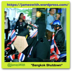 Anonymous Motorcycle Driver during "Bangkok Shutdown" march on Sukhumvit Road, Bangkok, Thailand